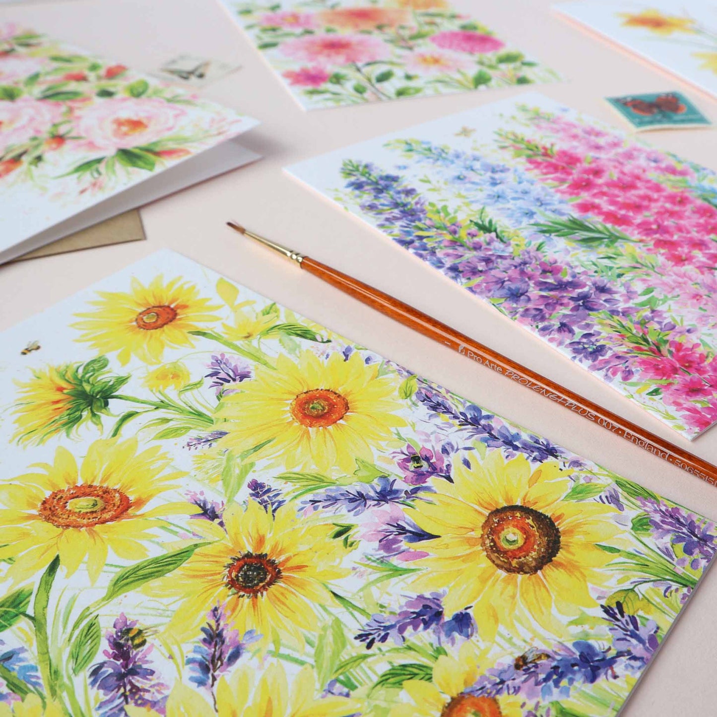 A variety of every day greeting cards with colourful floral designs featuring sunflowers, delphiniums, dahlias and rambling roses