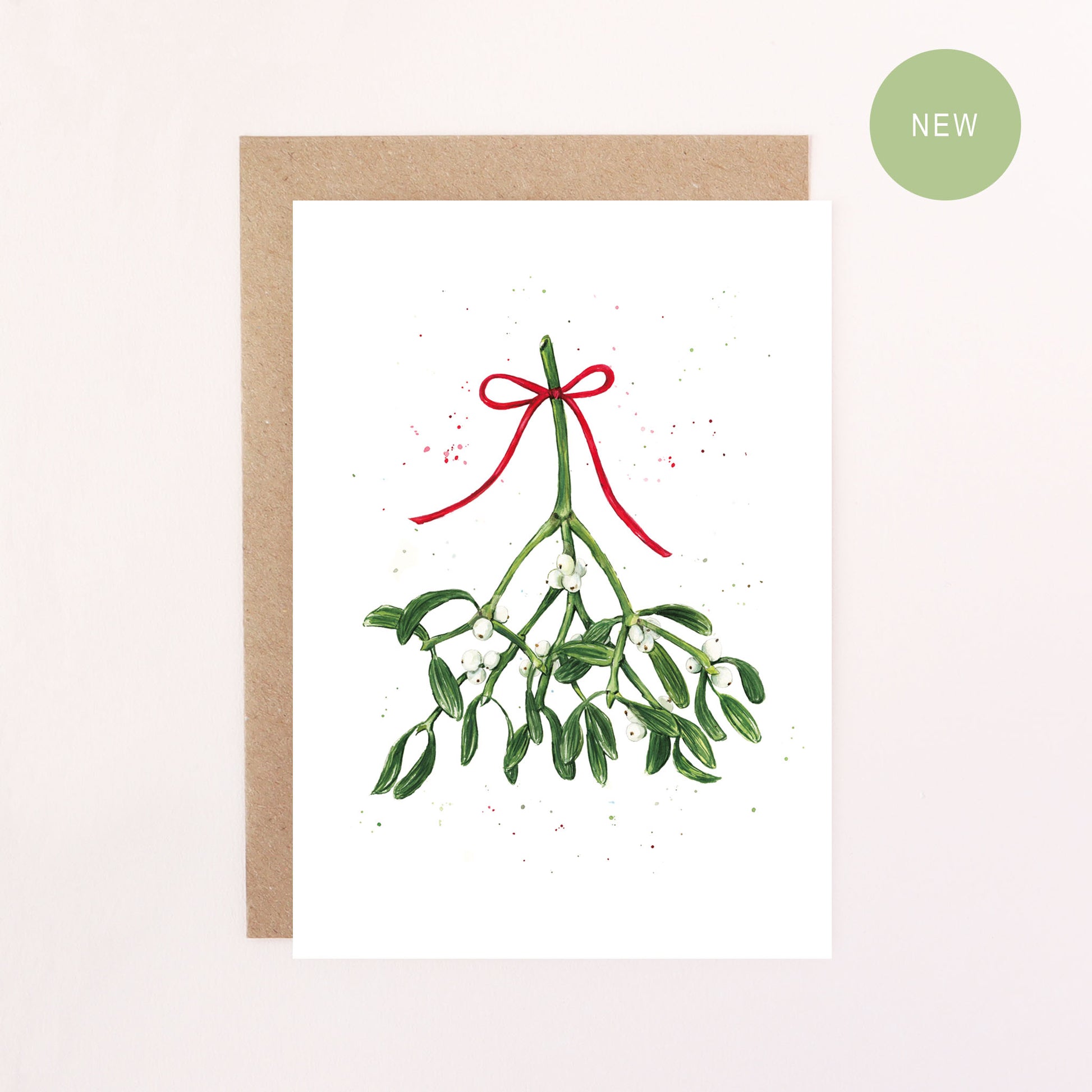 A greeting card illustration featuring a sprig of mistletoe tied with a red bow with a white background.