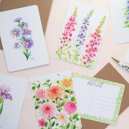 A floral mix of postcards featuring Foxgloves, Dahlias, Aster, Larkspur and Iris. 